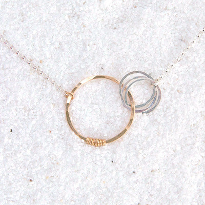 love necklace with three small circles